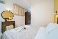 Postel nebo postele na pokoji v ubytování Ilias Apartments