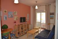 Televízia a/alebo spoločenská miestnosť v ubytovaní Apartamentos Aretusa Zahara