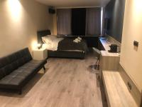 A seating area at DISTRiCT 01-Luxury Urban Lofts