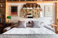 A bed or beds in a room at Classic and chic apartments in Trastevere