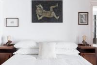 A bed or beds in a room at Classic and chic apartments in Trastevere