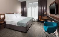 TV a/nebo společenská místnost v ubytování Holiday Inn Prague by IHG