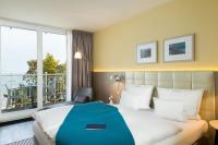 Postel nebo postele na pokoji v ubytování Hotel AM MEER & Spa