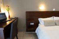 Posteľ alebo postele v izbe v ubytovaní HOTEL HILL