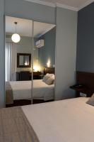 Posteľ alebo postele v izbe v ubytovaní HOTEL HILL