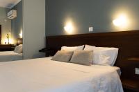 Posteľ alebo postele v izbe v ubytovaní HOTEL HILL