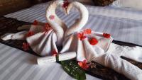 Umma Bali Menjangan Retreatにあるベッド