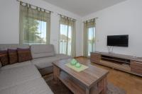 TV a/nebo společenská místnost v ubytování Apartmani Špoljar