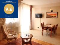 A television and/or entertainment centre at Lola Apartman