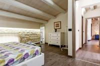 Łóżko lub łóżka w pokoju w obiekcie Villa Antica Aia Relax