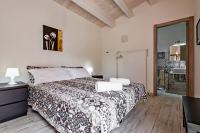 Łóżko lub łóżka w pokoju w obiekcie Villa Antica Aia Relax