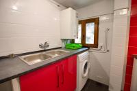 A kitchen or kitchenette at Cuencaloft el balcon de Ali