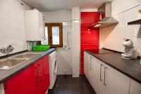 A kitchen or kitchenette at Cuencaloft el balcon de Ali
