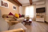 A television and/or entertainment centre at Cuencaloft el balcon de Ali