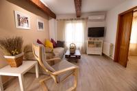 A television and/or entertainment centre at Cuencaloft el balcon de Ali