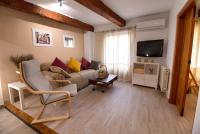A television and/or entertainment centre at Cuencaloft el balcon de Ali