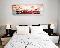 Postel nebo postele na pokoji v ubytování Cervantes Apartamentos