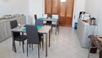A kitchen or kitchenette at Sandalia B&B
