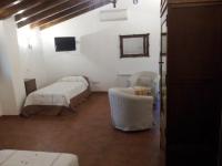 Postel nebo postele na pokoji v ubytování Posada Villa Maria