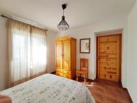 Łóżko lub łóżka w pokoju w obiekcie Complejo Apartamentos Rurales Molino de Abajo