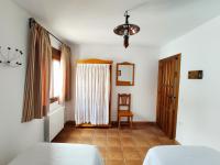 Łóżko lub łóżka w pokoju w obiekcie Complejo Apartamentos Rurales Molino de Abajo
