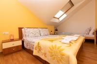 Posteľ alebo postele v izbe v ubytovaní Apartman Monika
