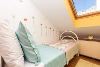 Posteľ alebo postele v izbe v ubytovaní Apartman Monika