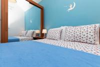 Posteľ alebo postele v izbe v ubytovaní Apartman Monika