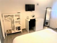 Posteľ alebo postele v izbe v ubytovaní Apartments & Rooms Formenti