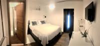 Posteľ alebo postele v izbe v ubytovaní Apartments & Rooms Formenti