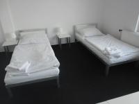 Postel nebo postele na pokoji v ubytování bike-Hotel Měděnec