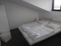 Postel nebo postele na pokoji v ubytování bike-Hotel Měděnec