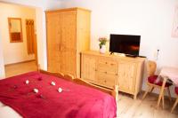 Televízia a/alebo spoločenská miestnosť v ubytovaní Apartments Marie B