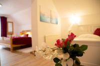 Posteľ alebo postele v izbe v ubytovaní Apartments Marie B
