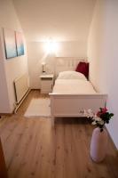Posteľ alebo postele v izbe v ubytovaní Apartments Marie B