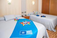 Posteľ alebo postele v izbe v ubytovaní RVHotels Ametlla Mar