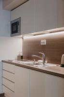 Kuchyňa alebo kuchynka v ubytovaní Kényelmes apartman a belváros szélén