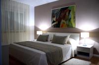 Posteľ alebo postele v izbe v ubytovaní Apartment Akvarel