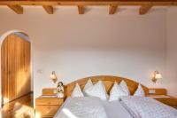 A bed or beds in a room at Solaia Hotel & Guesthouse