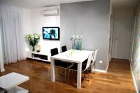 Televízia a/alebo spoločenská miestnosť v ubytovaní Apartment Akvarel