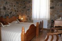 Postel nebo postele na pokoji v ubytování ATRATSA Mountain Suites