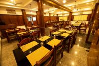 Hotel Guruvayur Darshanにあるレストランまたは飲食店