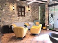 Posezení v ubytování Villa de Plan Apartments&Suites