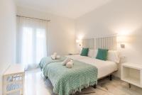 Posteľ alebo postele v izbe v ubytovaní Cantó Malagueta Beach by ELE Apartments
