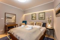 Posteľ alebo postele v izbe v ubytovaní Ambria Apartments Dune