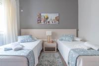 Postel nebo postele na pokoji v ubytování Kleio by Heloni Apartments