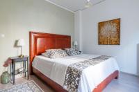Postel nebo postele na pokoji v ubytování Kleio by Heloni Apartments