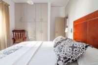 Postel nebo postele na pokoji v ubytování Kleio by Heloni Apartments