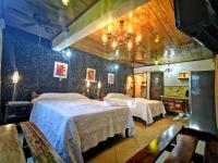 Hotel Costa Verdeにあるベッド