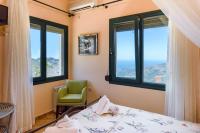 A bed or beds in a room at Best View Mountain Villa